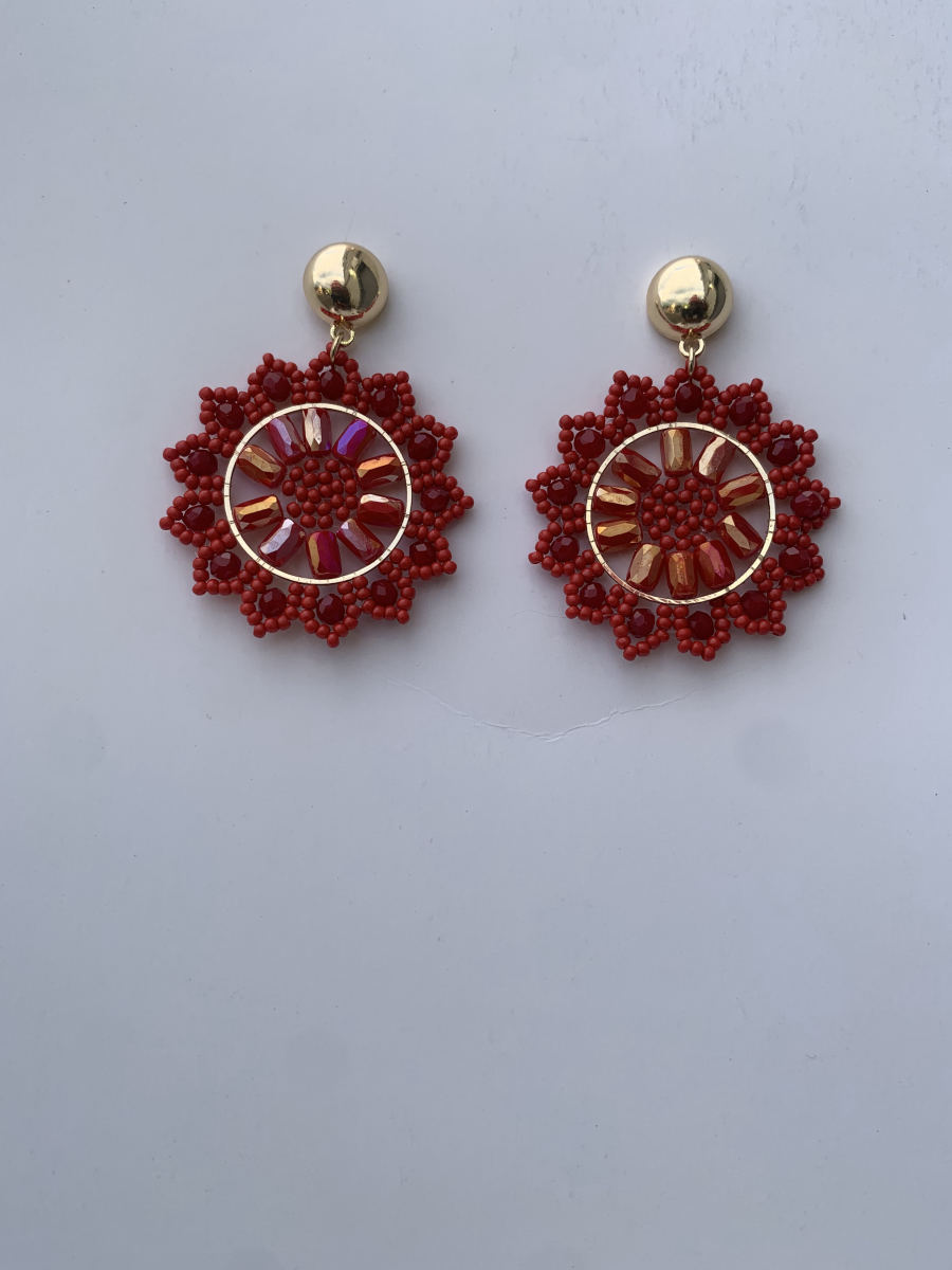 Bold red and orange seed bead mandala disc earrings with faceted crystal accents and gold dome stud top.