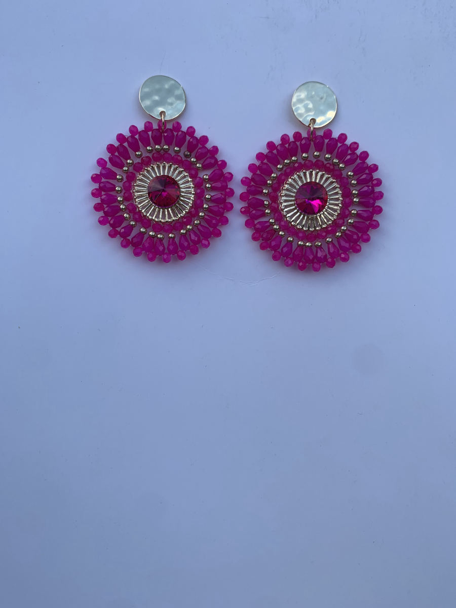 Round disc earrings with large rivoli crystal centre and dense fuchsia pink crystal drop bead fringe, gold stud top.