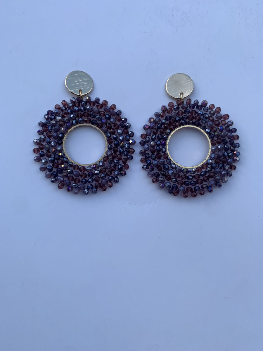 Large open circle hoop earrings in mixed plum and mauve faceted crystals with flat gold disc stud top.