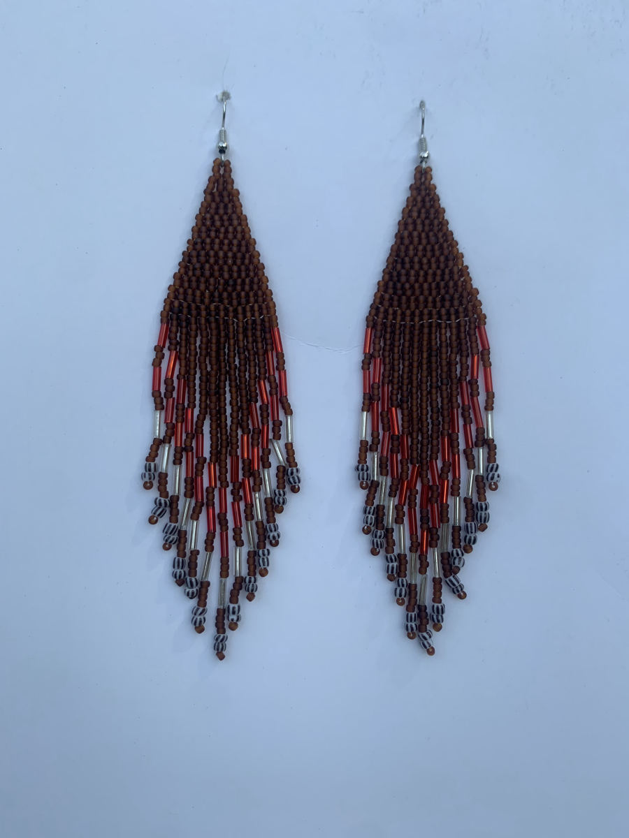 Long diamond-point fringe earrings in warm brown with copper-red and silver bugle bead chevron accent and black-and-white patterned tip beads, wire hook.