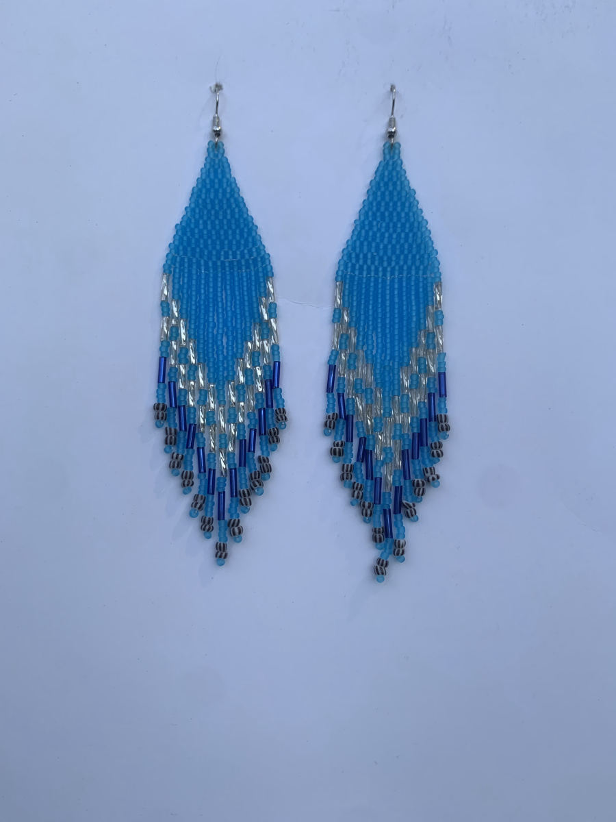 Long diamond-point fringe earrings in sky blue with royal blue and silver bugle bead chevron accent and black-and-white patterned tip beads, wire hook.