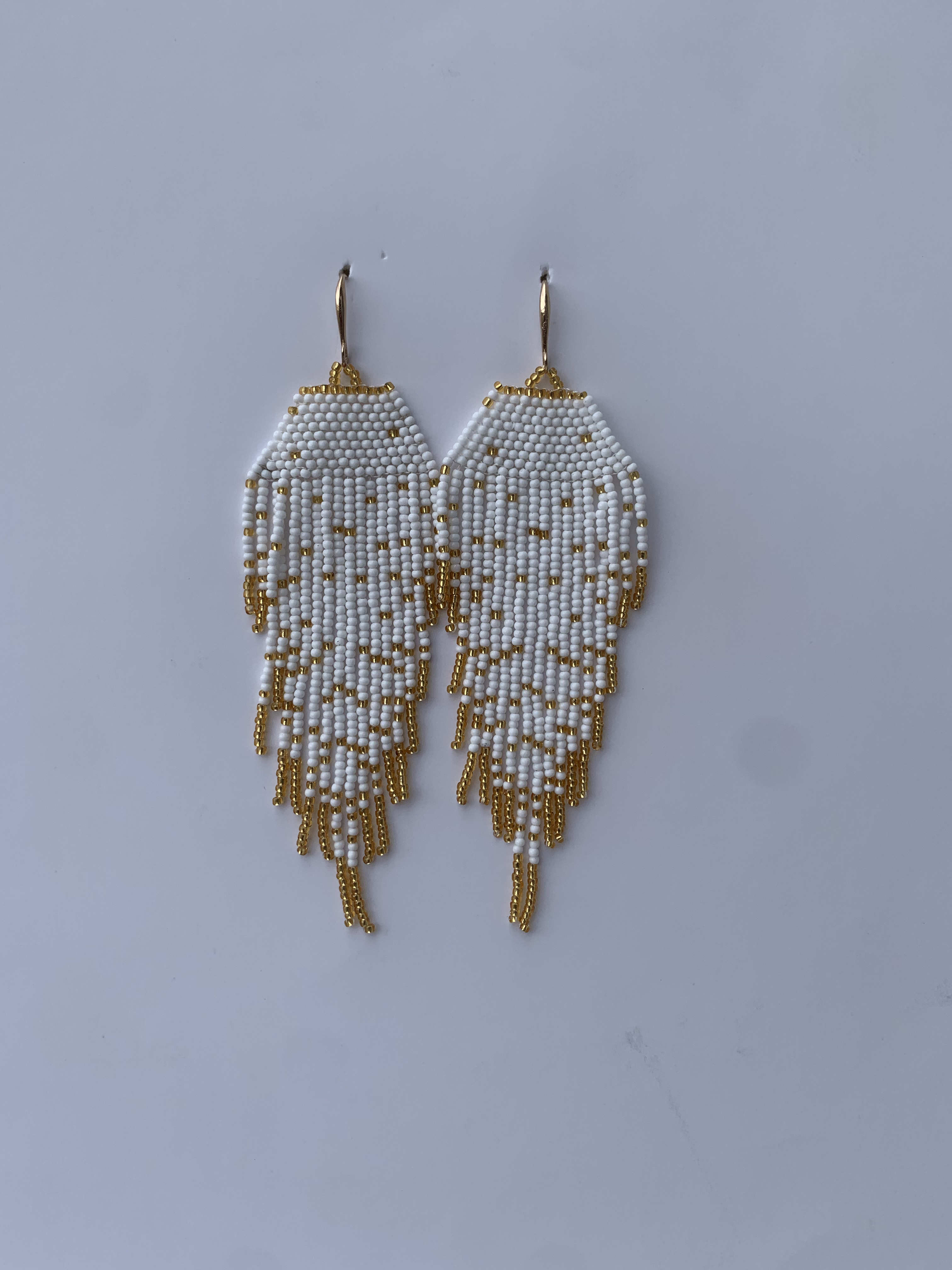 Mampong Ivory Wing — handmade ivory, gold, cream beaded fringe earrings by Rama, Ghana, Duncan BC