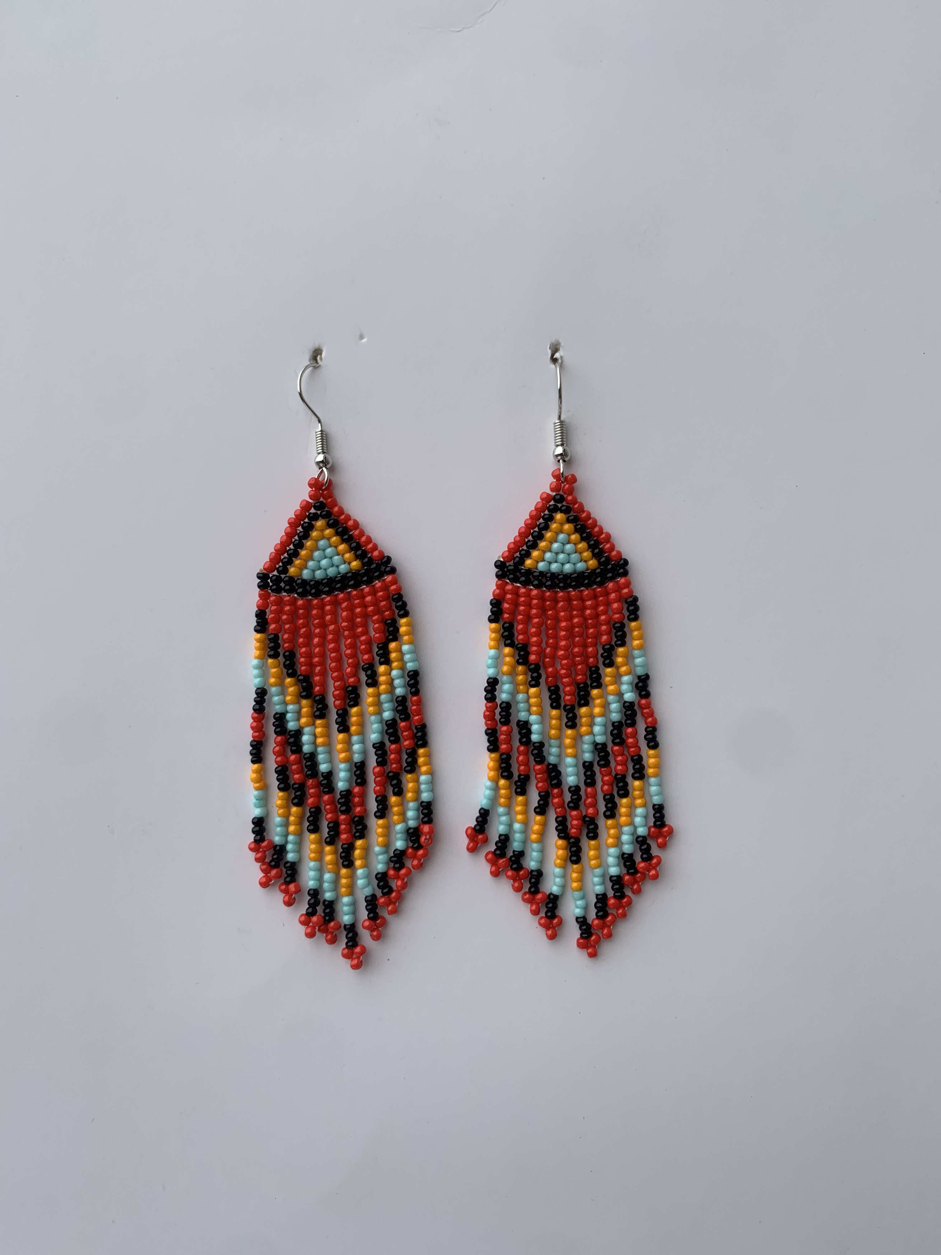 Elubo Fiesta Fringe — handmade red, teal, yellow beaded fringe earrings by Rama, Ghana, Duncan BC