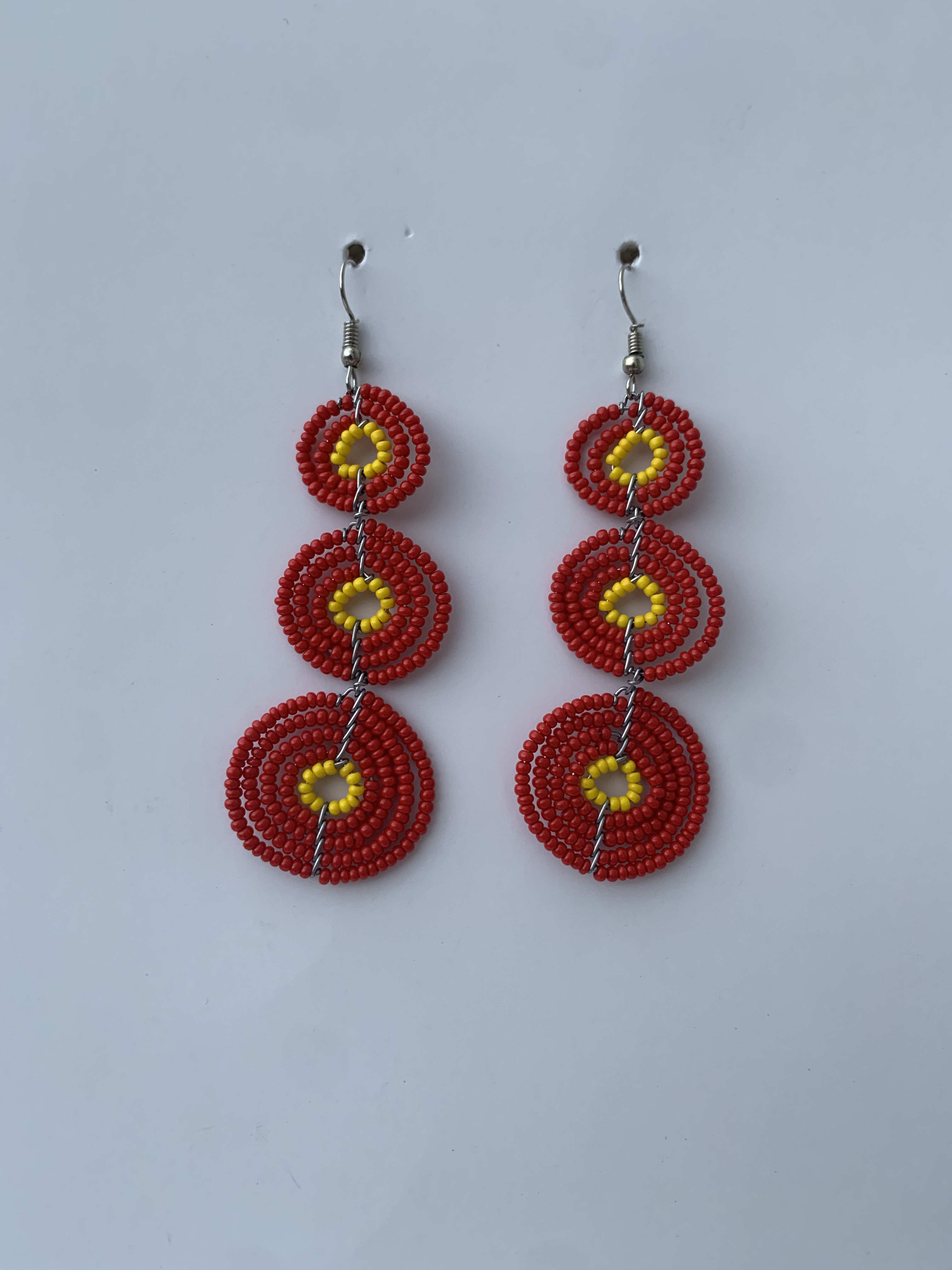 Adawso Ruby Discs — handmade red, gold beaded maasai earrings by Rama, Ghana, Duncan BC