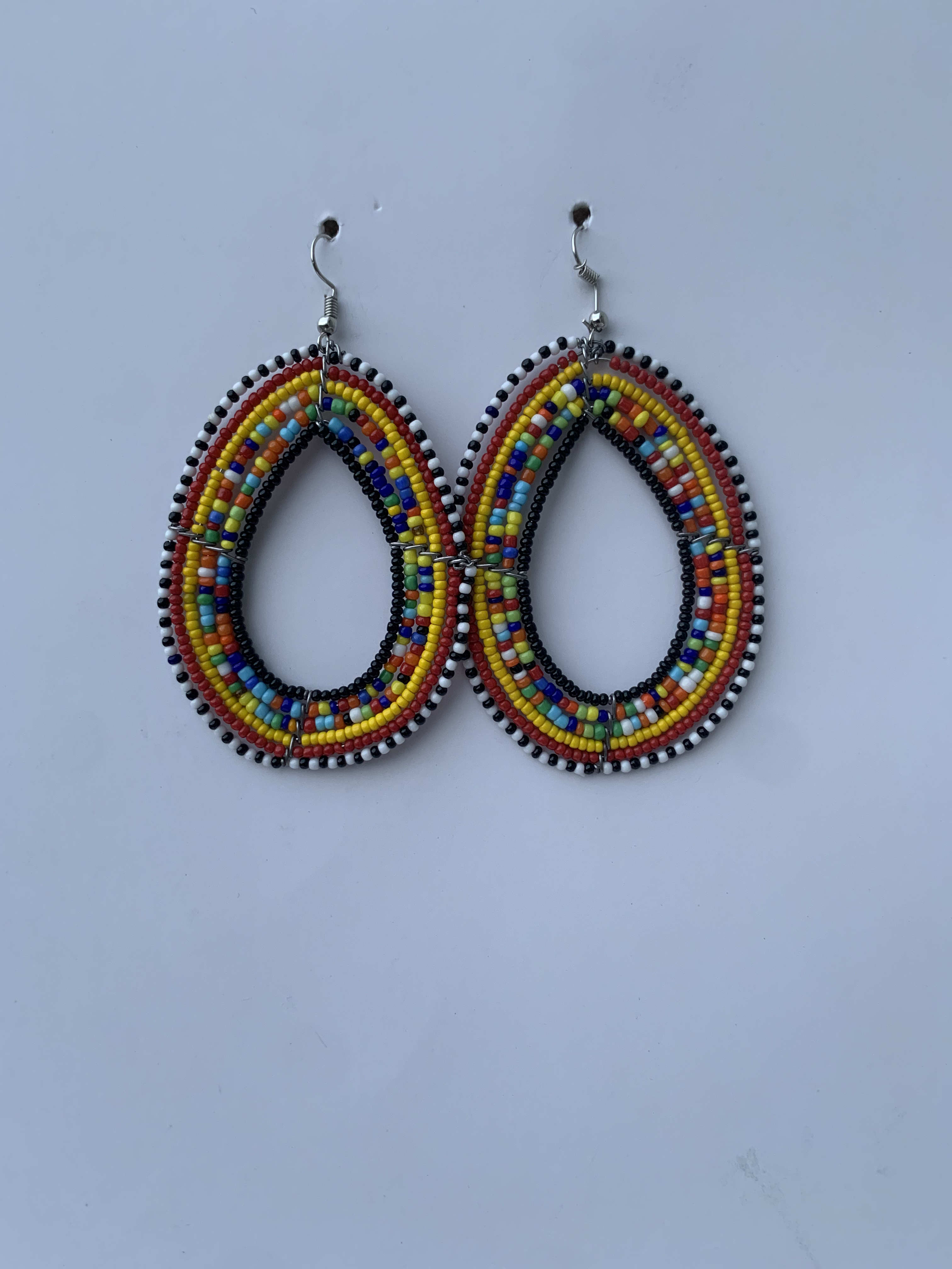 Asamankese Rainbow Hoops — handmade multicolor, rainbow beaded maasai hoop earrings by Rama, Ghana, Duncan BC