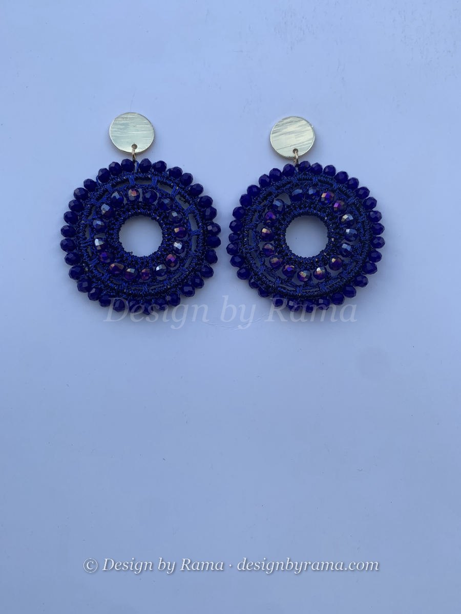Open circle hoop earrings with crochet lace base and faceted navy AB crystals, flat gold disc stud top.