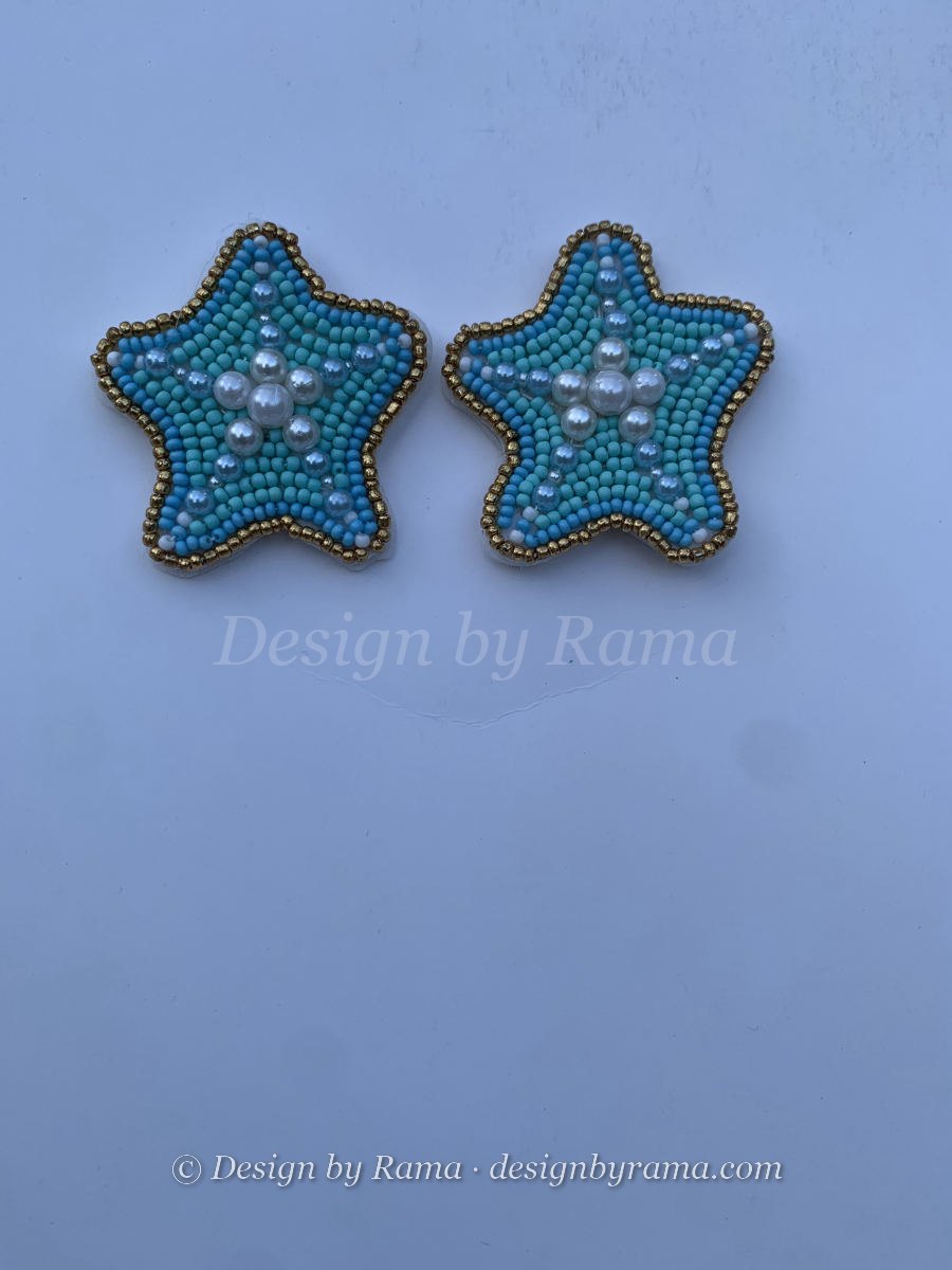 Small five-pointed star stud earrings in turquoise seed beads with pearl cluster centre.