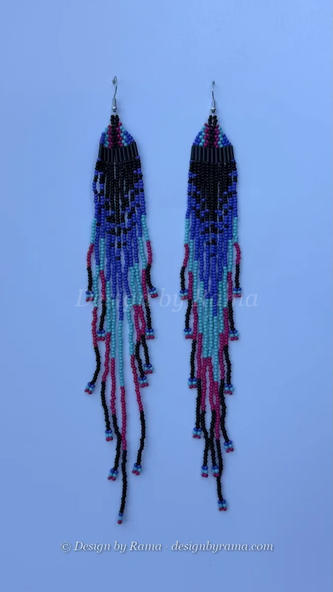 Pair of long beaded fringe earrings in black, blue, and pink.
