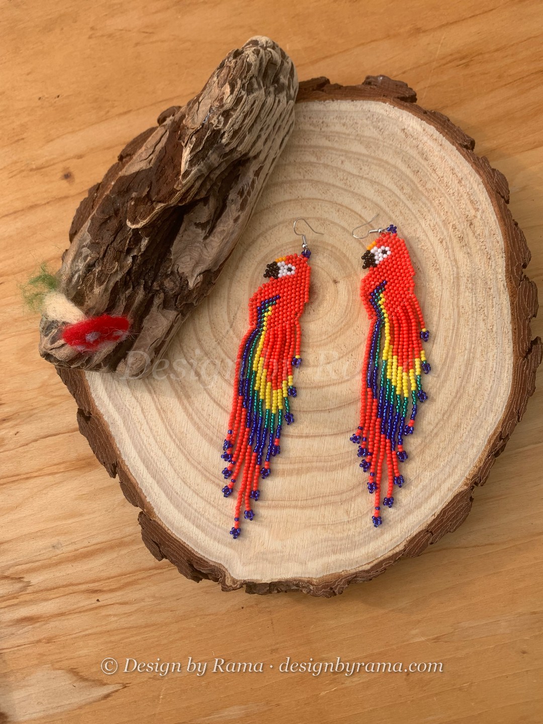 Nsuta Scarlet Macaw — handmade red, yellow, blue, rainbow beaded novelty earrings by Rama, Ghana beads, Duncan BC